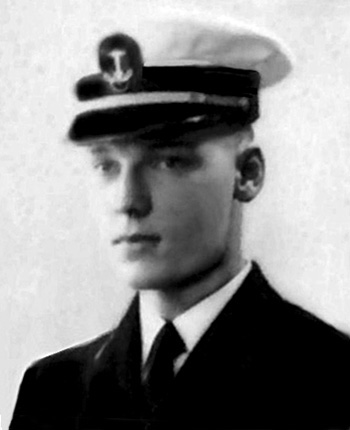 Man in a  U.S. Navy suit and cap.