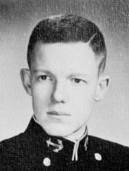 Close up photo of a man in a U.S. Navy uniform.