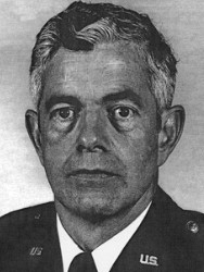 Close up photo of a man in a U.S. Air Force suit.